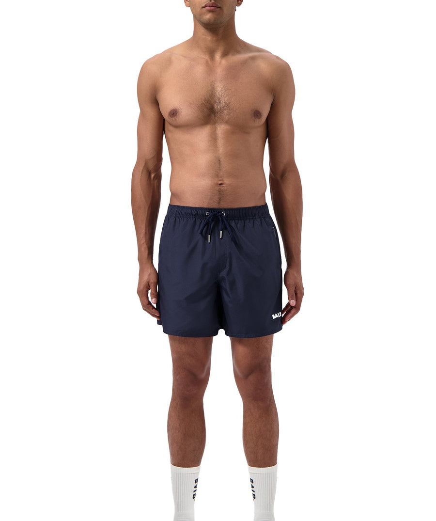 BALR Monogram Swim Shorts B1451.1034 – premium swim shorts featuring an all-over BALR monogram print, an elasticated waistband with a drawcord, and two zippered pockets. Made from lightweight, quick-drying fabric for ultimate comfort and style by the water.