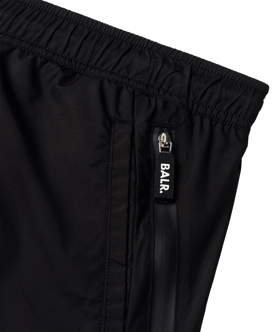 BALR Tape Swim Shorts B1451.1036 – stylish swim shorts featuring an elasticated waistband with a drawcord, BALR-branded side tape detailing, and two zippered pockets. Made from lightweight, quick-drying fabric, perfect for beach days and poolside lounging.