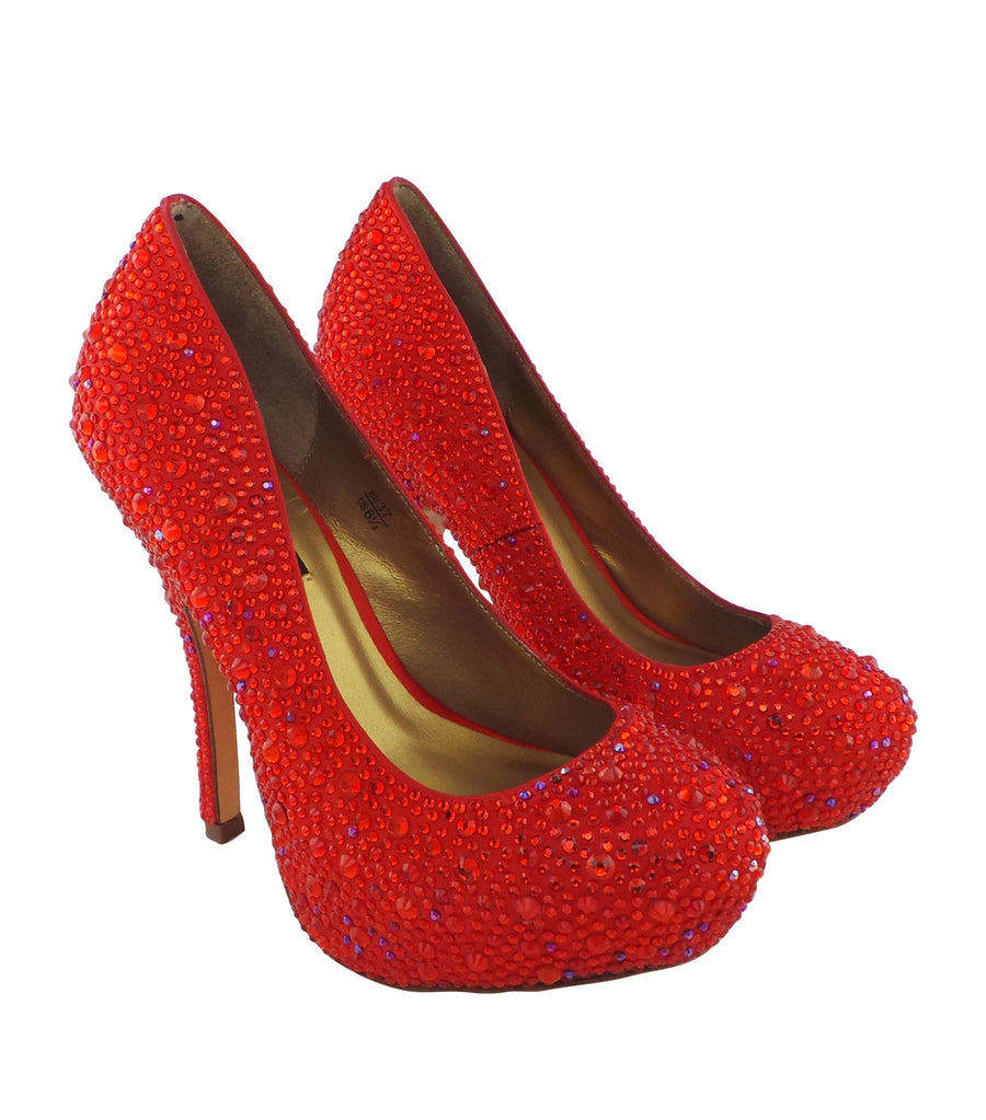 Step into luxury with the Benjamin Adams Rio Jewel Platforms in red. Perfect for glam events &amp; special occasions.