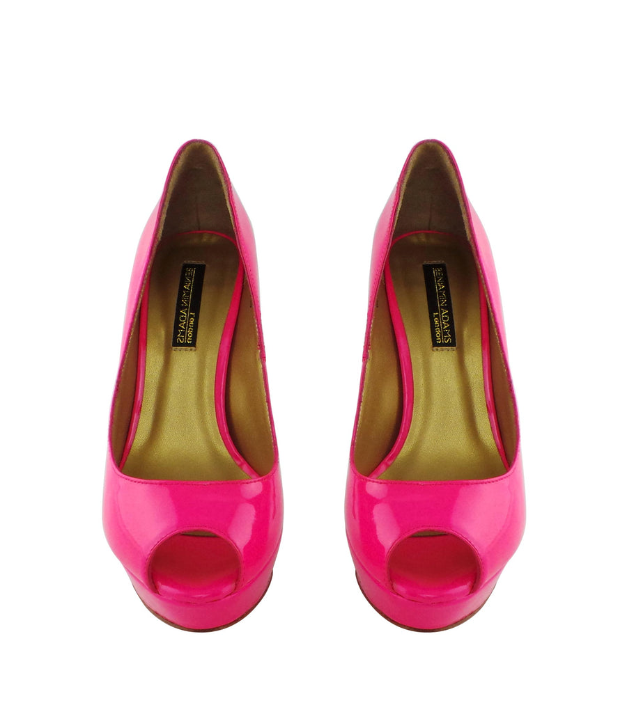 Benjamin Adams Anaheim fuchsia patent leather peep toe pumps. Featuring a sleek design, 5-inch heel, and vibrant color. Perfect for any special occasion!