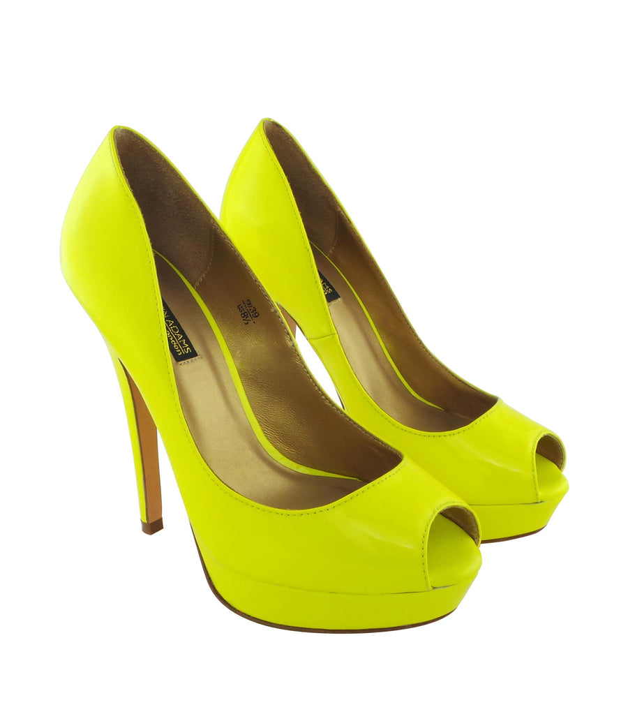 Benjamin Adams Anaheim lemon yellow patent leather peep toe pumps. Featuring a sleek design, 5-inch heel, and glossy finish. Perfect for any occasion