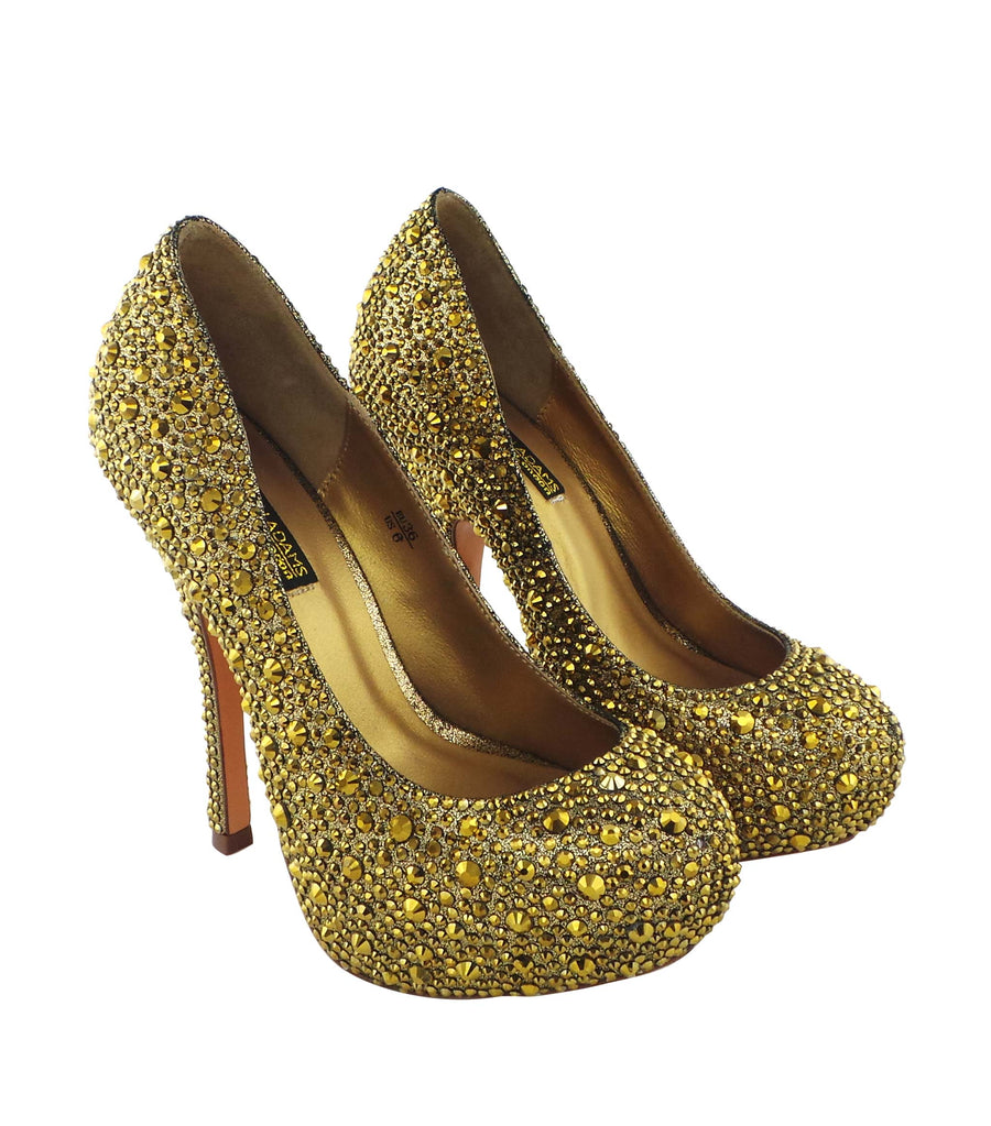 Step into luxury with the Benjamin Adams Rio Jewel Platforms in gold. Perfect for glam events &amp; special occasions