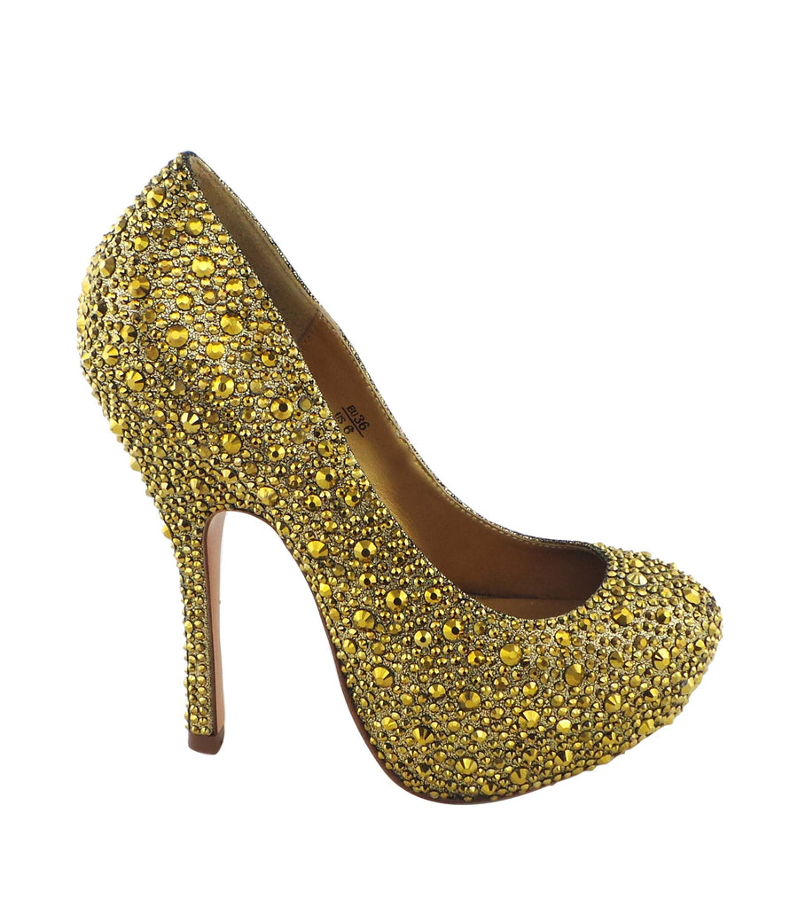 Step into luxury with the Benjamin Adams Rio Jewel Platforms in gold. Perfect for glam events &amp; special occasions