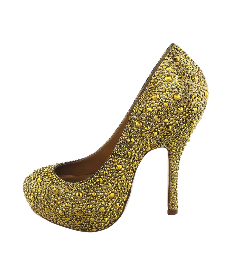 Step into luxury with the Benjamin Adams Rio Jewel Platforms in gold. Perfect for glam events &amp; special occasions