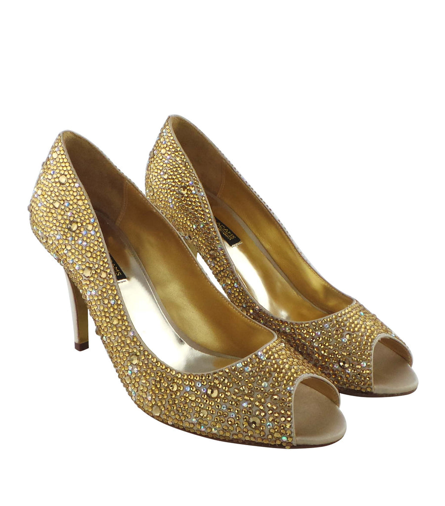 Champagne Benjamin Adams Oslo evening shoes are a toned down version of the vampy platform styles. The Oslo is a gorgeous peep toe pump with crystals encrusted all over. The moderate 3 1/4" heel gives you a bit of height while still preserving comfort.