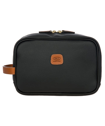 Bric's black leather toiletry bag with brown leather accents, gold-tone double zipper closure, side handle, and 'Made in Italy' logo patch, style code BBJ00601.001.