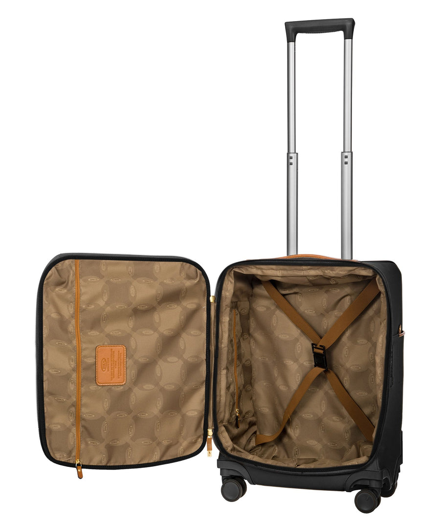 Bric's black 32" Firenze carry-on spinner suitcase with brown leather accents, front zip pocket, gold-tone zippers, telescopic handle, and 360° spinner wheels, style code BBJ15290.001