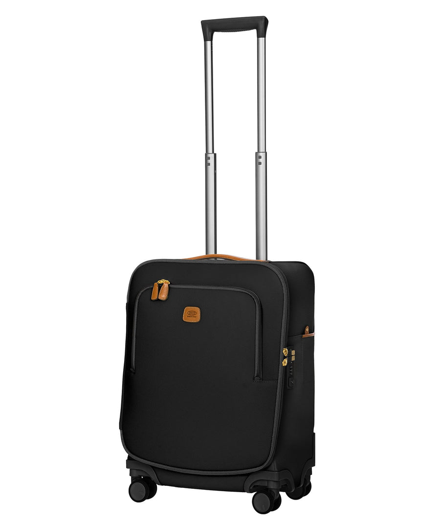 Bric's black 32" Firenze carry-on spinner suitcase with brown leather accents, front zip pocket, gold-tone zippers, telescopic handle, and 360° spinner wheels, style code BBJ15290.001