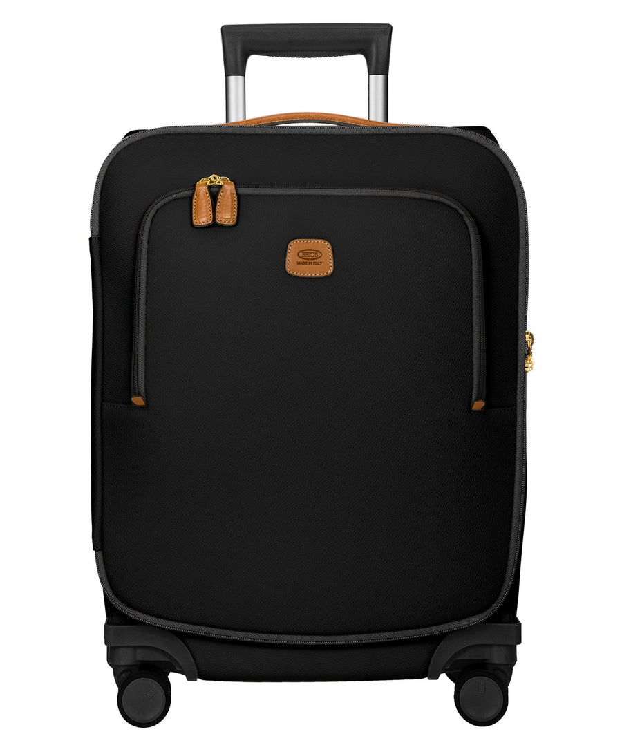 Bric's black 32" Firenze carry-on spinner suitcase with brown leather accents, front zip pocket, gold-tone zippers, telescopic handle, and 360° spinner wheels, style code BBJ15290.001