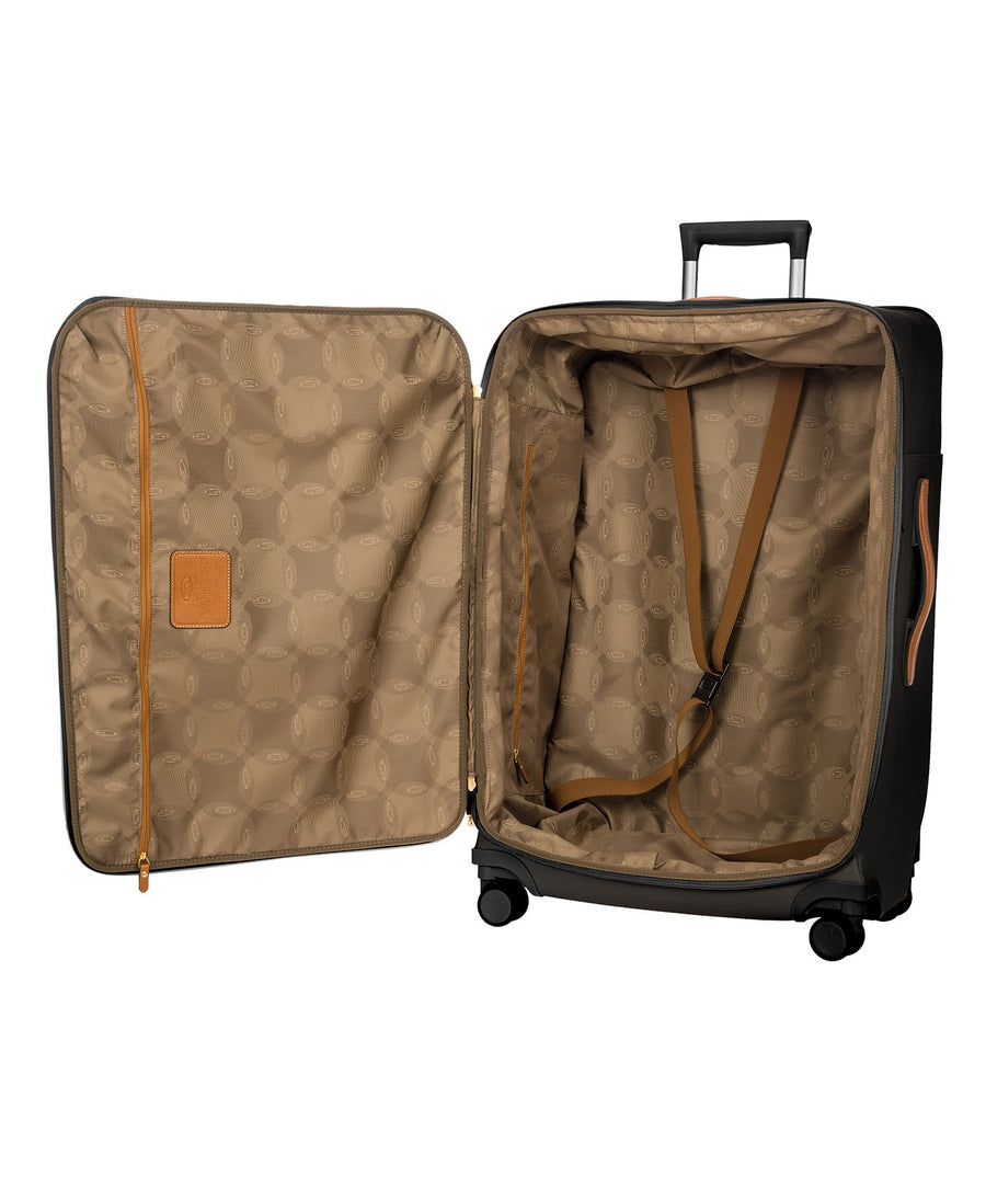 Bric's black 32" Firenze Trolley checked spinner suitcase with brown leather accents, front zip pocket, gold-tone zippers, telescopic handle, and 360° spinner wheels, style code BBJ15291.