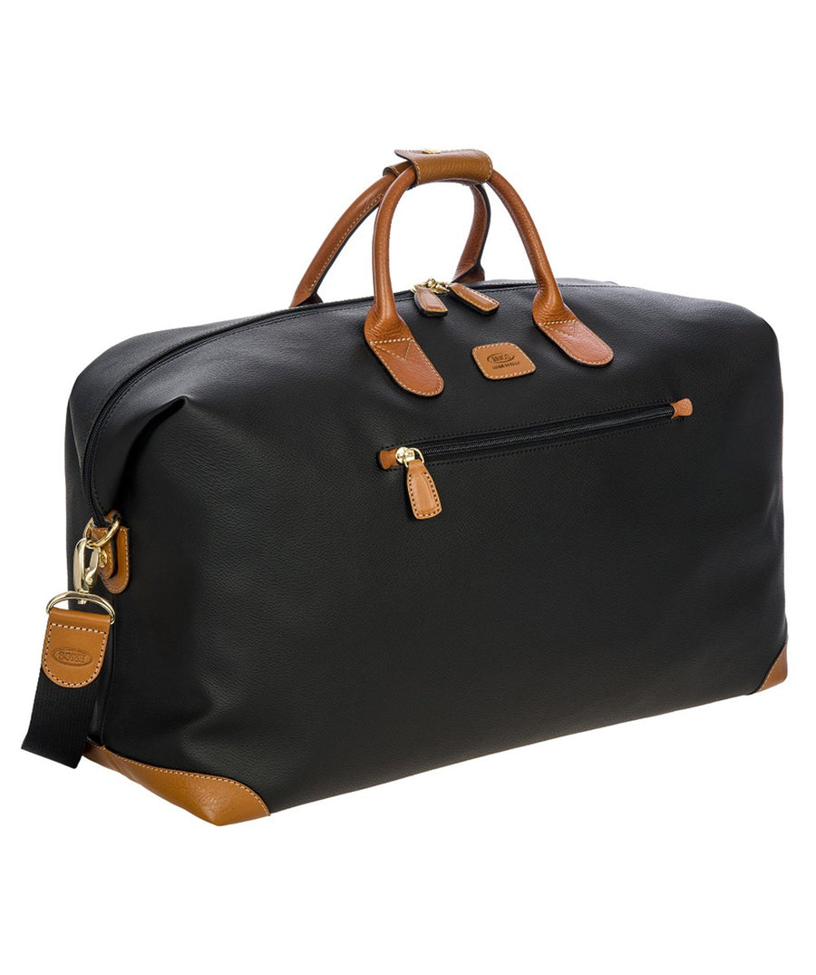 Bric's 22" Firenze Cargo Duffle Bag in black with brown leather accents, featuring double top handles, a front zip pocket, gold-tone zippers, and a spacious interior with logo-printed lining and an inner zip pocket. Style code BBJ20202.