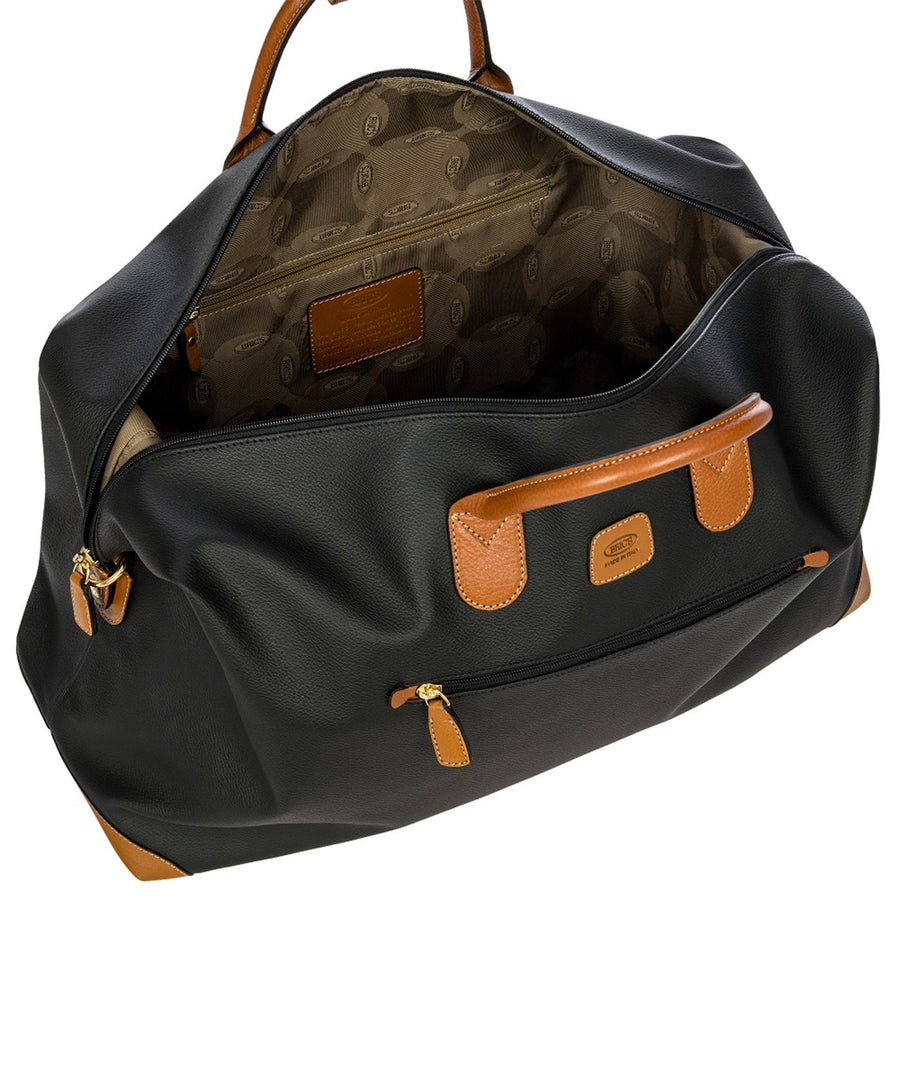 Bric's 22" Firenze Cargo Duffle Bag in black with brown leather accents, featuring double top handles, a front zip pocket, gold-tone zippers, and a spacious interior with logo-printed lining and an inner zip pocket. Style code BBJ20202.