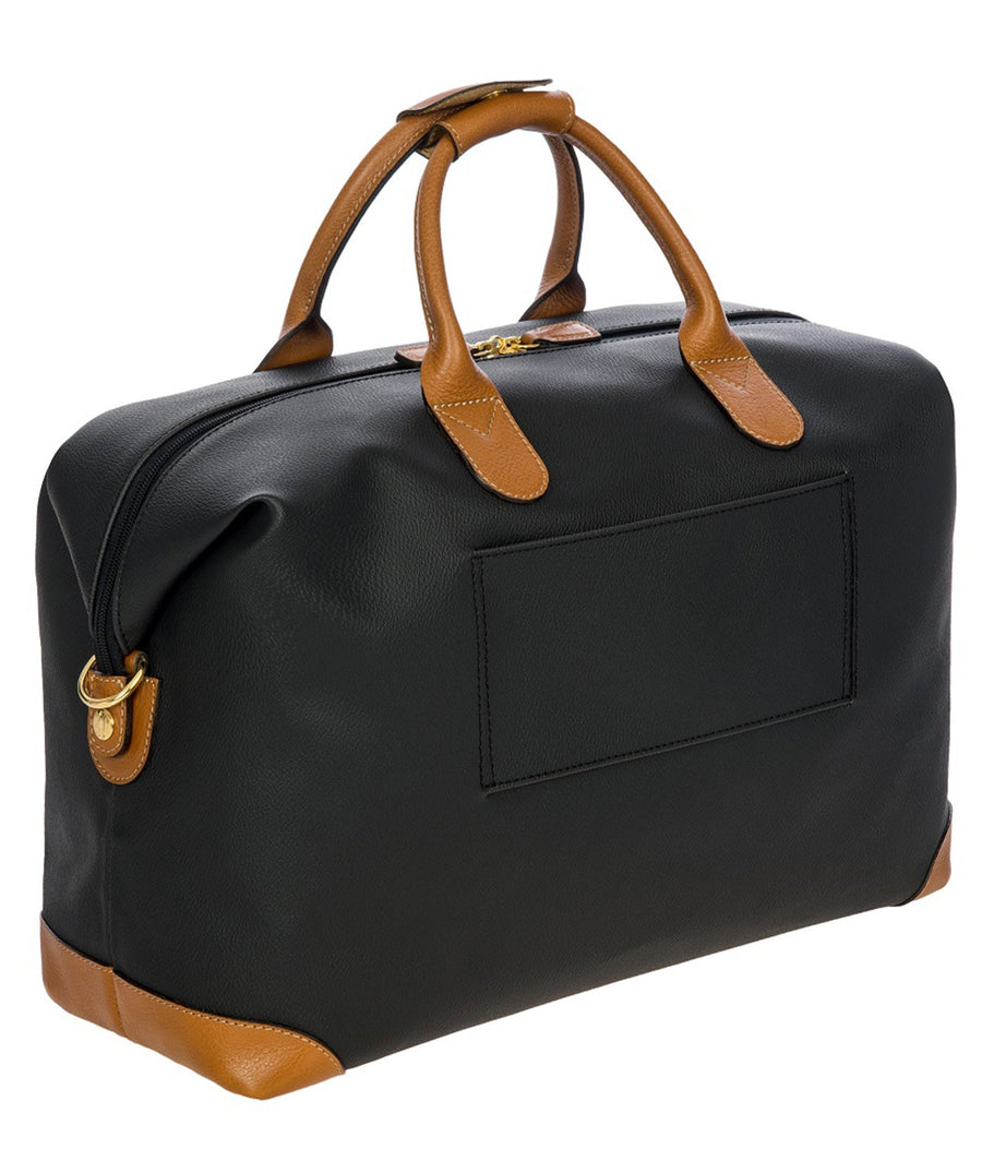 Bric's 18" Firenze Cargo Duffle Bag in black with brown leather accents, featuring double top handles, a front zip pocket, gold-tone zippers, and a spacious interior with logo-printed lining and an inner zip pocket. Style code BBJ20203.