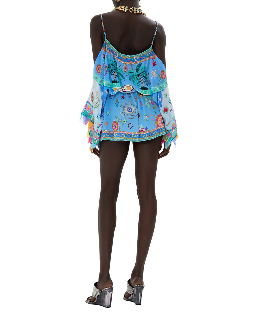 CAMILLA A Painted Village Drop Shoulder Playsuit 00032004 – A vibrant playsuit featuring the signature Painted Village print, a flattering drop-shoulder design, and lightweight fabric, perfect for chic resort wear