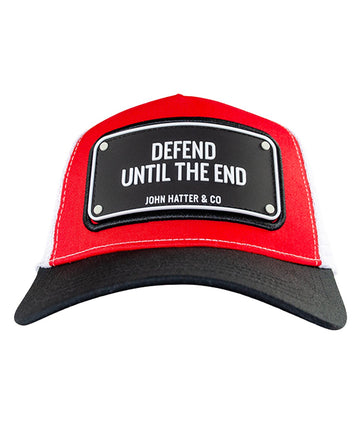 JOHN HATTER & CO Defend Until The End Rubber Edition Cap R-1166-U00 – a bold trucker-style cap featuring a powerful ‘Defend Until The End’ rubber logo on the front